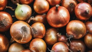 Display of onions at a market stall.